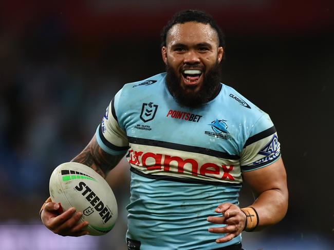 MELBOURNE, AUSTRALIA - MAY 11: Siosifa Talakai of the Sharks runs in to score a try during the round 10 NRL match between Melbourne Storm and Cronulla Sharks at AAMI Park on May 11, 2024 in Melbourne, Australia. (Photo by Graham Denholm/Getty Images)