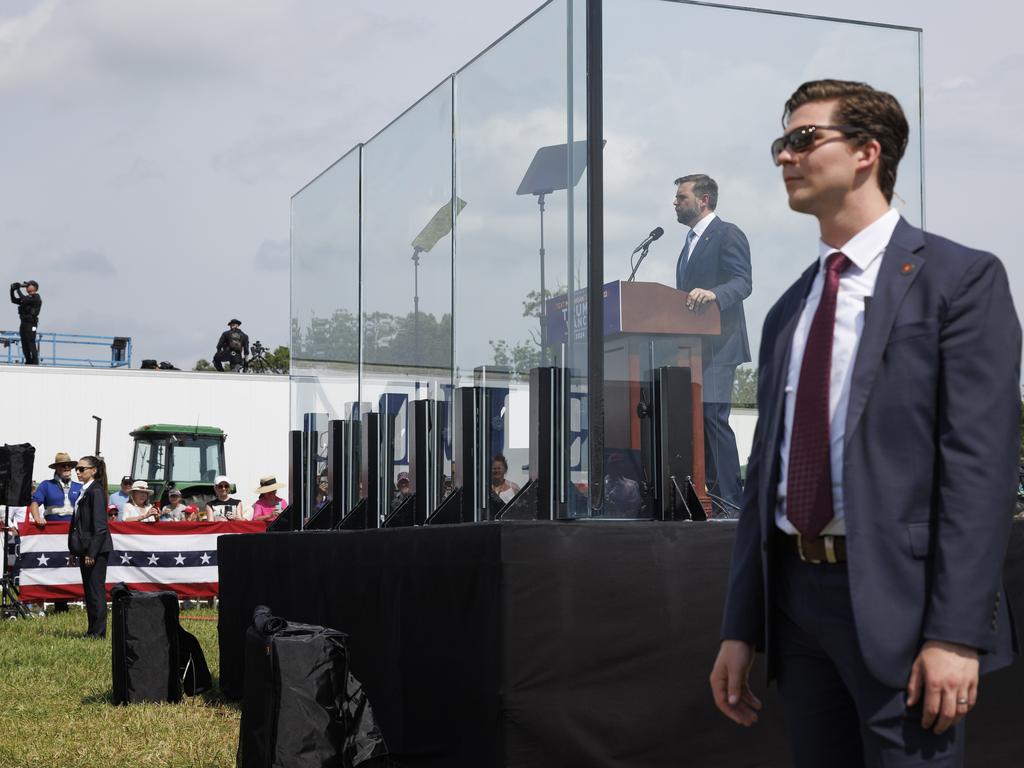 JD Vance has sparked outrage by lamenting that school shootings are a “fact of life” in America. A striking image of him at an earlier rally standing behind bulletproof glass quickly went viral online in light of his comments. Picture: Tom Brenner for The Washington Post via Getty Images