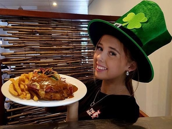 The Yardz Hotel worker Charli with an Irish parmigiana special on St Patrick's Day.