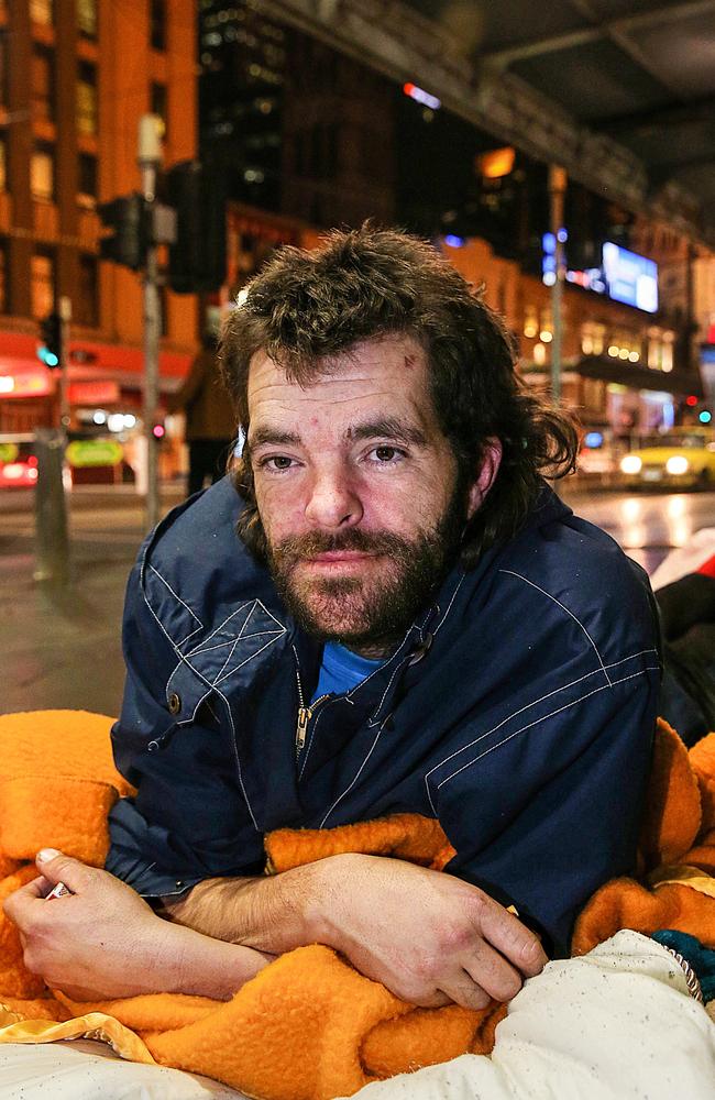 Recently arrived from Perth, Avan is sleeping on the footpath on Flinders Street. Picture: Ian Currie