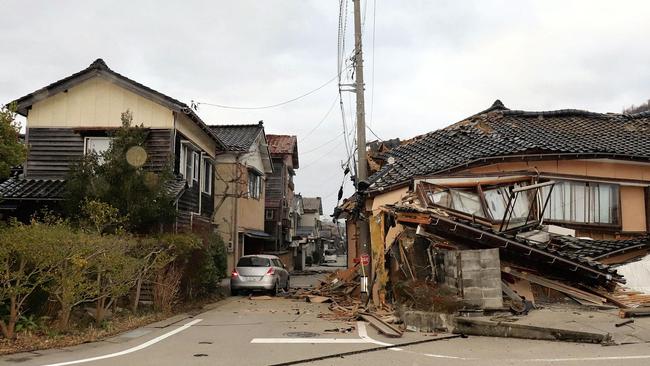 This general view shows badly damaged buildings along a street in the city of Wajima, Ishikawa prefecture. Picture: Yusuke FUKUHARA / Yomiuri Shimbun / AFP