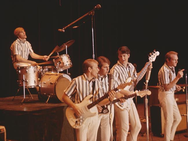 CALIFORNIA - CIRCA 1964: Rock and roll band "The Beach Boys" perform onstage in circa 1964 in California. (L-R) Dennis Wilson, Al Jardine, Carl Wilson, Brian Wilson, Mike Love. (Photo by Michael Ochs Archives/Getty Images)