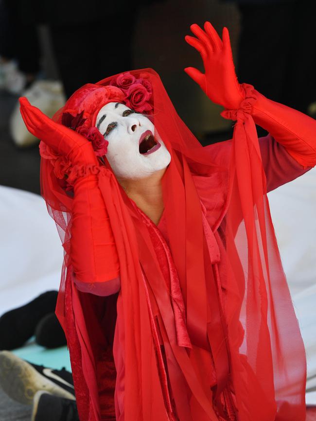 A touch of kabuki drama at a protest in Adelaide on Wednesday. Picture: AAP Image/David Mariuz