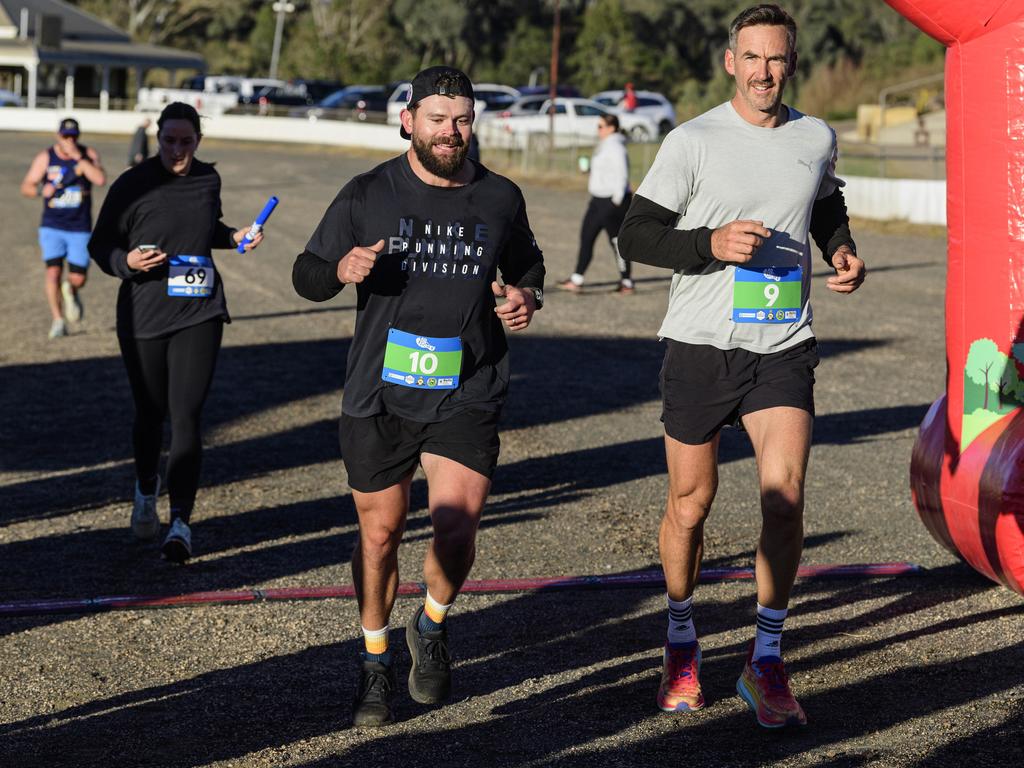 Solo runners Des Loughlin (left) and Tom Seaton in the 40 for Fortey relay at Toowoomba Showgrounds, Sunday, June 8, 2025. Picture: Kevin Farmer