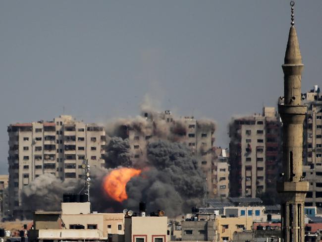 An explosion on a residential tower caused by Israeli raids in the northern Gaza Strip on October 12, 2023 in Gaza City, Gaza. Picture: Ahmad Hasaballah/Getty Images