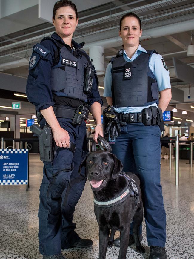 Leading Senior Constable Emma McPherson and Detective Sergeant Jessica Gilmore with Dio. Picture: Jake Nowakowski