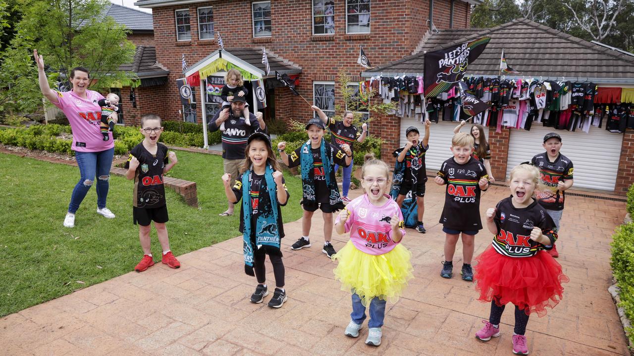 Penrith Panthers fans are preparing for a match of a lifetime. Georgi Edwards and Buntie Edwards, 9 weeks, Bentley Tomkins-Edwards, 8, Joel Edwards, Dottie-may Edwards, 2, Zara Wood, 6, Kai Wood, 8, Kimberley McGregor Poppie-Grace Tomkins-Edwards, 5, Tristan McGregor, 9, William Gowing, 8, Shayla Edwards, 14, Natasha McGregor, 6, and Henry Edwards, 8, from Blaxland, NSW. Picture: Justin Lloyd.