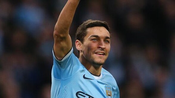 MANCHESTER, ENGLAND - NOVEMBER 24: Jesus Navas of Manchester City celebrates after scoring the sixth goal during the Barclays Premier League match between Manchester City and Tottenham Hotspur at Etihad Stadium on November 24, 2013 in Manchester, England. (Photo by Alex Livesey/Getty Images)