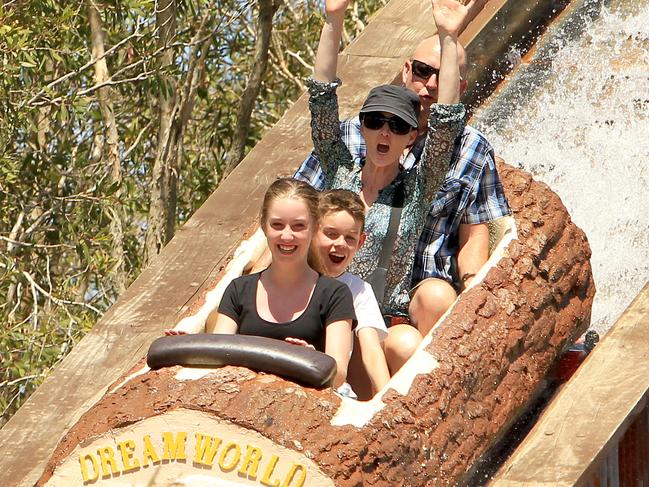 Holiday makers and locals pictured enjoying some of the thrill rides at Dreamworld on the Gold Coast Mr and Mrs Ian and Melissa Kent with their two children Taylor 12 and Kya 9 of  Adelaide on the Rocky Hollow Log Ride . Pic Mike Batterham