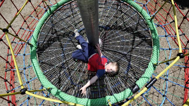 Alex inside the Montrose Community Adventure Playground’s pyramid.