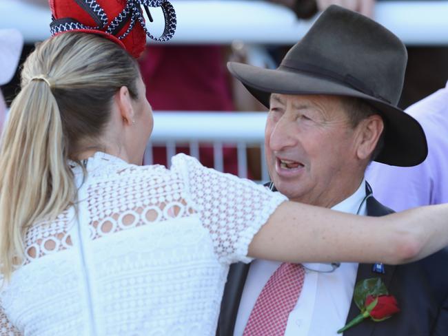 Proud father Jim Bowman hugs Stephanie Waller after son Hugh won again on the mighty mare. Picture: Getty Images)