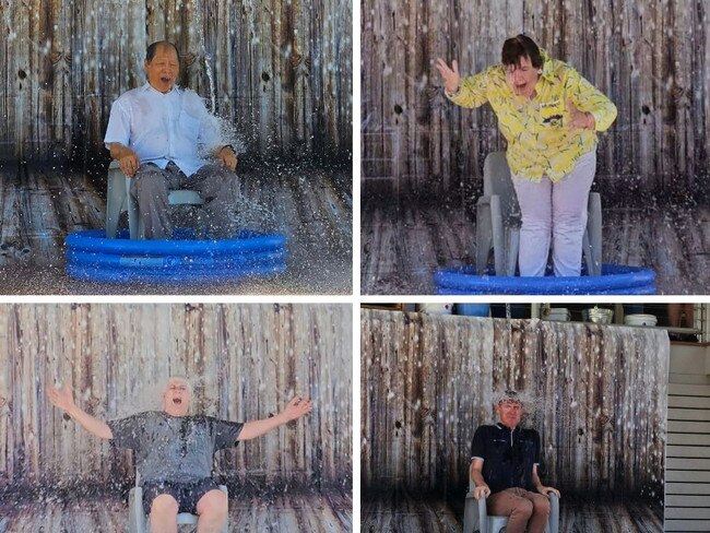 Former Lions District Govenor's (from left) Peter Ho, Kim Forrest, Ian Bruning and David Greenup get dunked to raise money for those affected by the recent bushfires around Millmerran Downs.