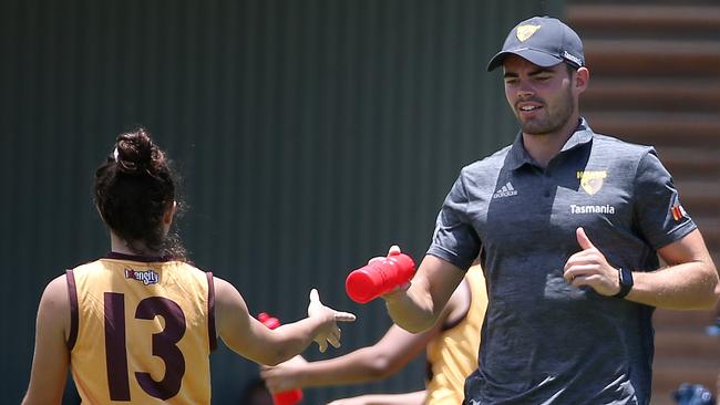 Hawthorn’s Conor Nash acts as a runner for the Big Rivers Hawks against Darwin Buffaloes in Kimberly, Northern Territory. Picture: Michael Klein