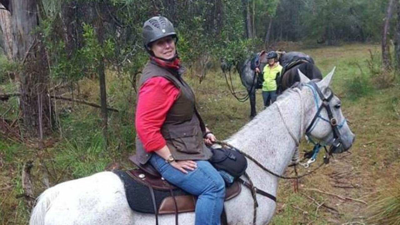 Cath with one of her horses riding in Victoria’ mountains. Picture: Supplied.