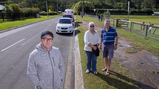 Worongary residents along Vince Hinde Dr near Pioneer Downs Park are calling on Gold Coast council to let patrons park on the verge or build a carpark. Residents Nick Flanagan, Toni Stride and Neville Stride. Picture: Jerad Williams