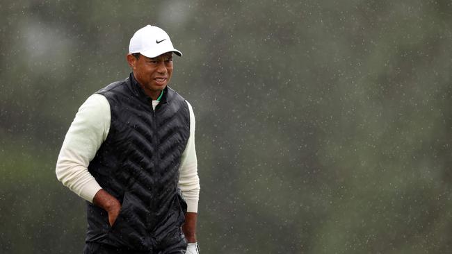 Tiger is out. Christian Petersen/Getty Images/AFP