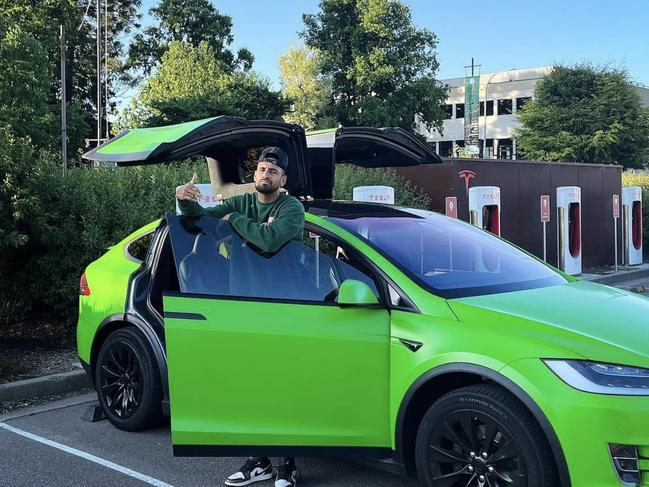 The tennis star is well known for his bright green Tesla.