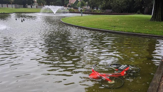 An Uber Jump bike appears to have been dumped in a Princes Park fountain, less than 24 hours after launching in Melbourne. Picture: Reddit