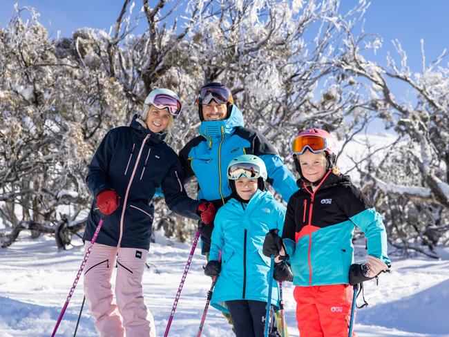 20/06/2021 Tourists (L-R) Christie Hampton and Jono Brauer with children Lilly Brauer and Ashleigh Hampton skiing at Thredbo Resort. Source: Thredbo Resort