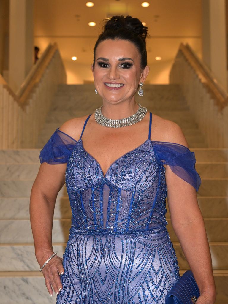 She paired the beaded and feathered gown with a bold eye look and silver jewellery. Picture: Tracey Nearmy/Getty Images