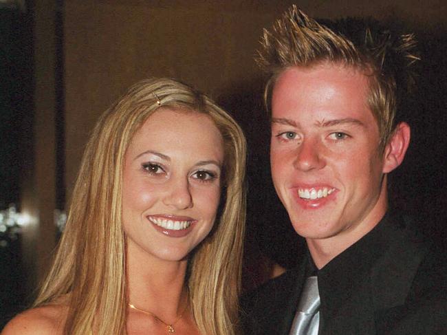 Kyly Boldy with Minardi driver James Courtney on March 2, 2001.