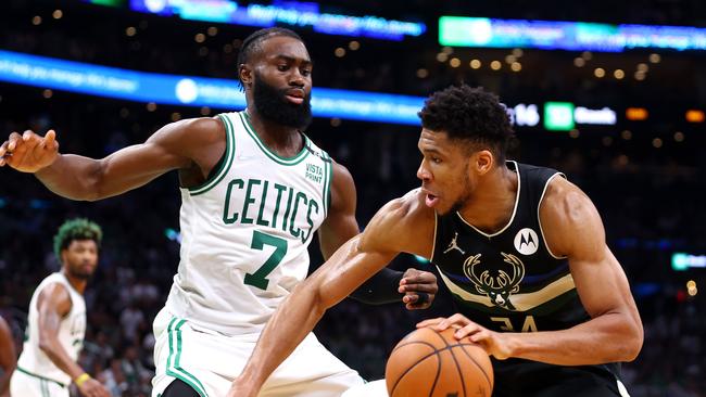 Giannis Antetokounmpo of the Milwaukee Bucks handles the ball against Jaylen Brown of the Boston Celtics. Picture: Adam Glanzman/Getty Images/AFP