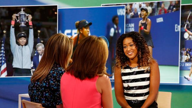 Naomi Osaka being interviewed after her victory. (Photo by Julian Finney/Getty Images)