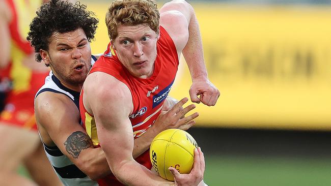 Gold Coast star Matthew Rowell moments before suffering a season-ending shoulder injury. Picture: Michael Klein