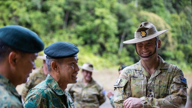 Commander of the 3rd Brigade, Brigadier Kahlil Fegan, DSC, speaks with Field Commander Royal Brunei Land Force Colonel Haji Mohammad Shanonnizam during Exercise Mallee Bull on 11 November 2022, Brunei. Picture: BDR Guy Sadler