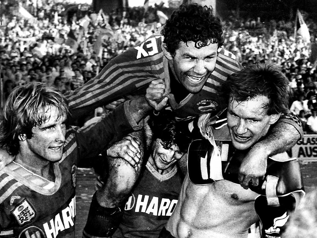 Paul Taylor (L) with Steve Edge (C) and Peter Wynn (R) after the 1983 grand final.