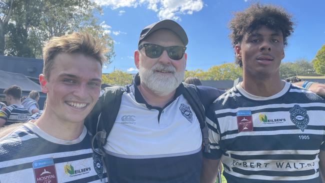 Brothers Colts 1 coach Greg Beaver with players Will Cartwright (left) and Kadin Pritchard (right) last season.