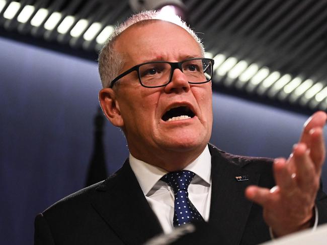 Australia's former prime minister Scott Morrison speaks to media during a press conference in Sydney on August 17, 2022. - Australia's Prime Minister Anthony Albanese on August 16 said that his predecessor Scott Morrison secretly seized control of five ministerial posts, labelling it an "unprecedented trashing of our democracy". (Photo by Steven Saphore / AFP)