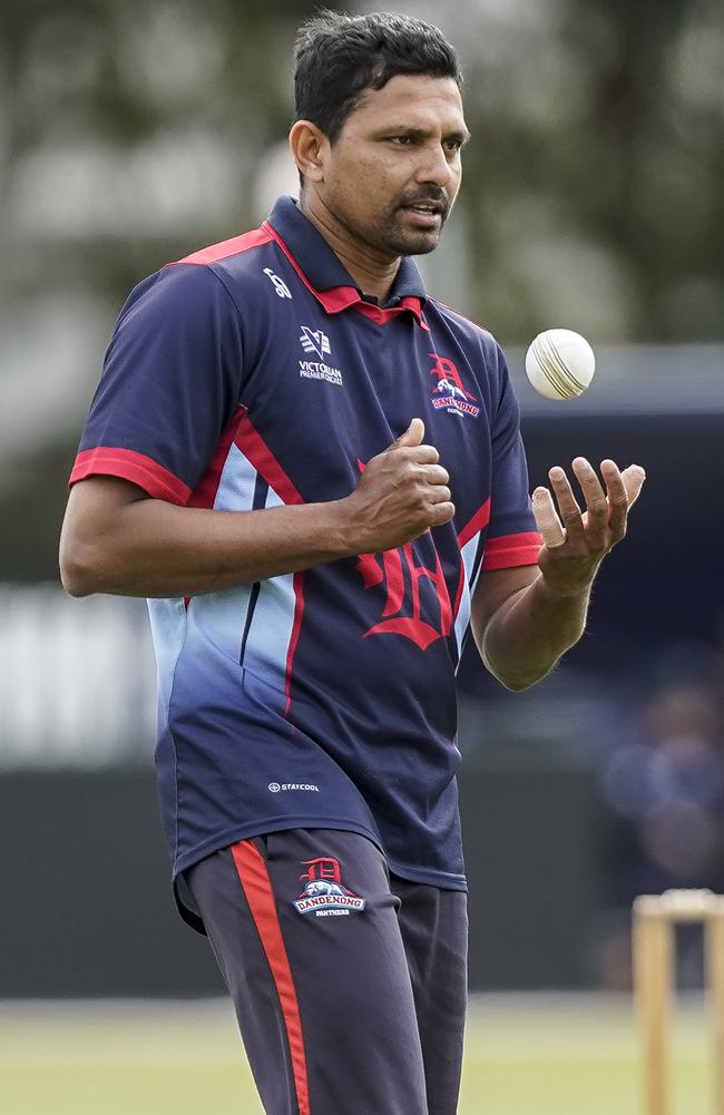 Suraj Randiv bowling for Dandenong in the 2020-21 grand final against Prahran. Picture: Valeriu Campan