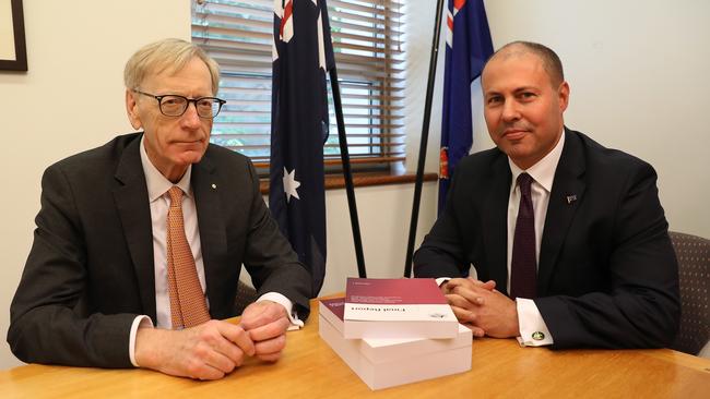 When invited by a photographer to shake the hand of Josh Frydenberg at a staged photo opportunity Commissioner Kenneth Hayne replied with a definitive “Nope”. Picture: Kym Smith