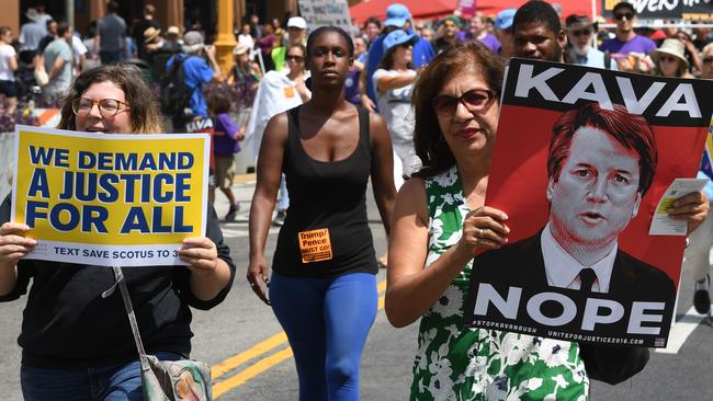 Demonstrators march through the city streets during the “unite for justice” rally in protest of judge Brett Kavanaugh's confirmation to the US Supreme Court. Picture: AFP