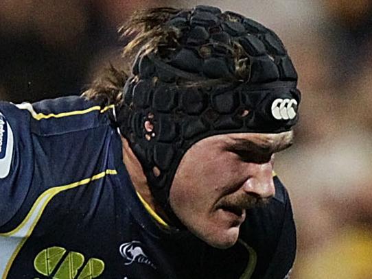 CANBERRA, AUSTRALIA - JULY 19: Ben Mowen of the Brumbies is tackled during the Super Rugby Qualifying FInal match between the Brumbies and the Chiefs at GIO Stadium on July 19, 2014 in Canberra, Australia. (Photo by Stefan Postles/Getty Images)