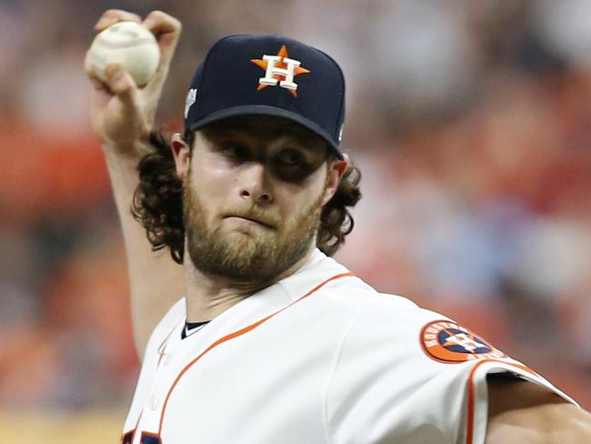 HOUSTON, TEXAS - OCTOBER 05:  Gerrit Cole #45 of the Houston Astros pitches in the fifth inning of Game 2 of the ALDS against the Tampa Bay Rays at Minute Maid Park on October 05, 2019 in Houston, Texas. (Photo by Tim Warner/Getty Images)