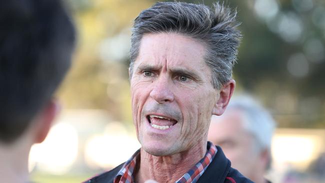 Adrian Rocco addresses his players during quarter-time in a game last year. Picture: Stephen Laffer