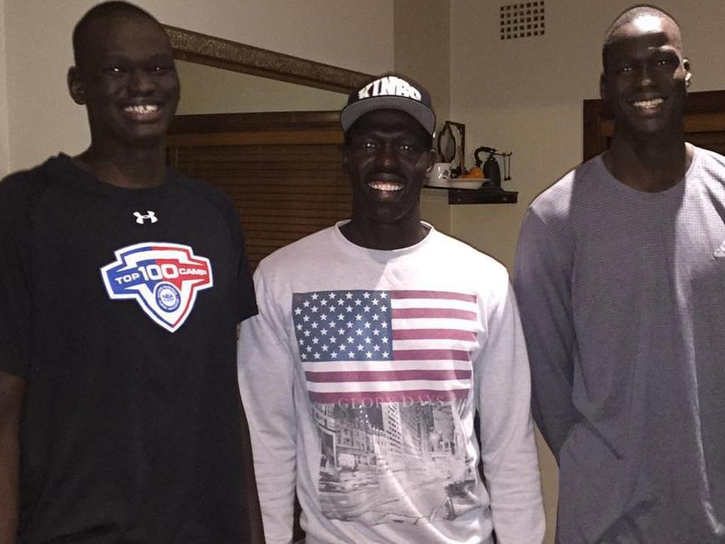 Talented family: Sydney Swans defender Aliir Aliir (C) and his cousin, NBA No.10 draft pick Thon Maker (R) with his brother Matur Maker (L). Picture: Instagram