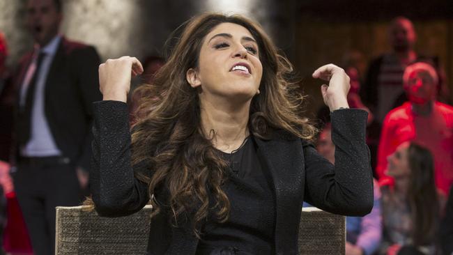 Public relations expert Francesca Chaouqui smiles as she is interviewed during an Italian TV show in Rome, Tuesday night, Dec. 1, 2015. Two Italian journalists, Gianluigi Nuzzi and Emiliano Fittipaldi, who wrote books detailing Vatican mismanagement face trial in a Vatican courtroom along with three people, including Chaouqui, accused of leaking them the information in a case that has drawn scorn from media watchdogs. (Massimo Percossi/ANSA via AP) ITALY OUT