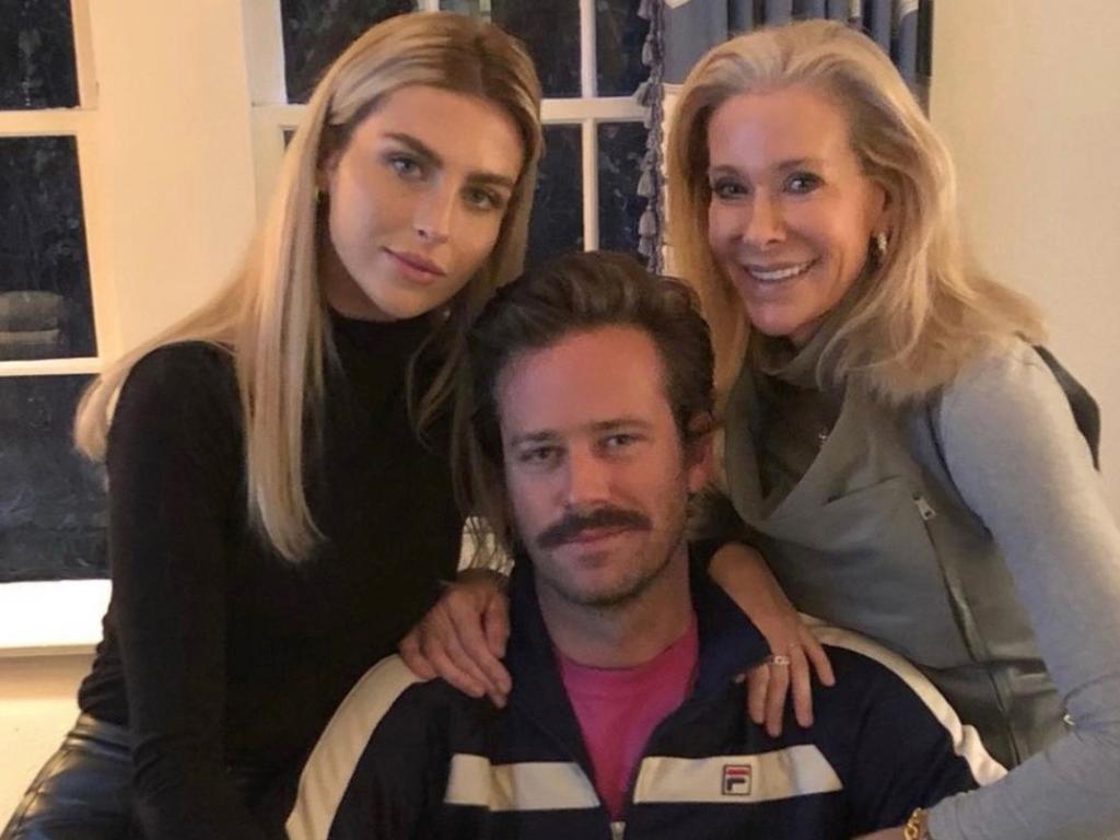 Armie Hammer with Paige and her mum. Picture: SplashNews.com