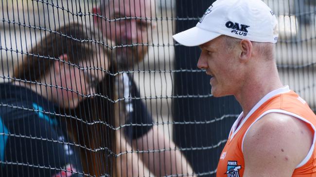 Robbie Gray chats to a young fan during Power training at Alberton Oval on Wednesday. Picture: AAP