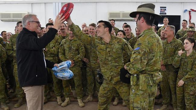 Scott Morrison with Australian troops at the Taji military complex near the Iraqi capital Baghdad yesterday. Picture: AAP