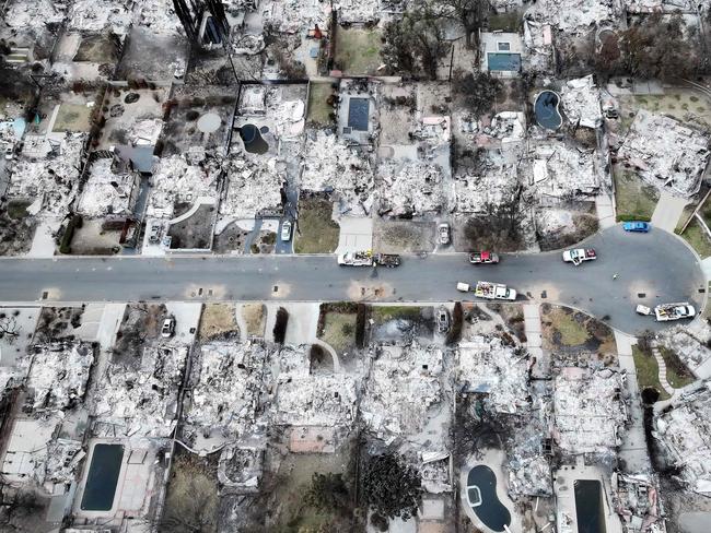 An aerial view of homes destroyed in the Eaton fire. Southern California is facing significant rainfall, which could cause flash flooding or mudslides. Picture: Getty Images via AFP