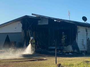 Fire burns through a home in Kingaroy. Photo: Kate McCormack