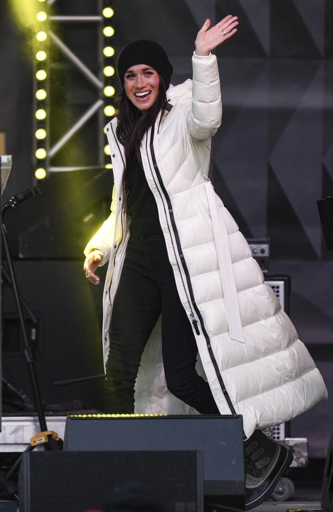 Meghan, the Duchess of Sussex, waves while attending a welcome celebration with her husband Britain's Prince Harry, the Duke of Sussex, during the 2025 Invictus Games, in Whistler, British Columbia.