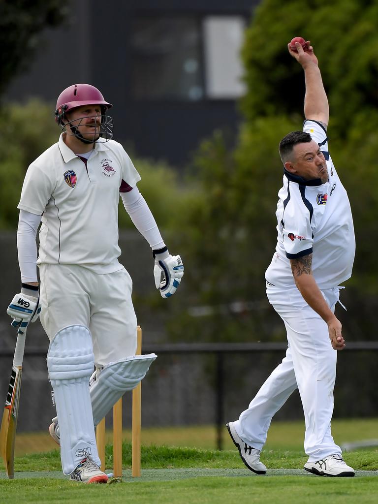 NMCA - Rivergum’&#149;s Jarrod Bannister walks in as Northern Socials bowler Robert LaRose rolls the arm over. Picture: Andy Brownbill