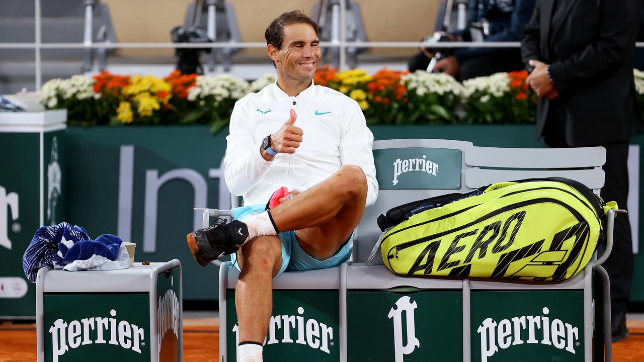 Rafael Nadal takes a moment to soak in his 13th French Open win.