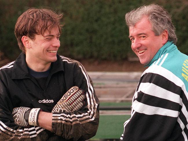 Soccer player Mark Bosnich (l) with coach Terry Venables after training for European based members of the Socceroos.