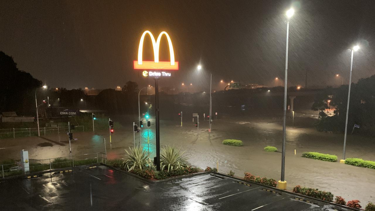 Melton Rd outside Toombul Shopping Centre was closed on Friday night due to flooding. Picture: Patrick Billings